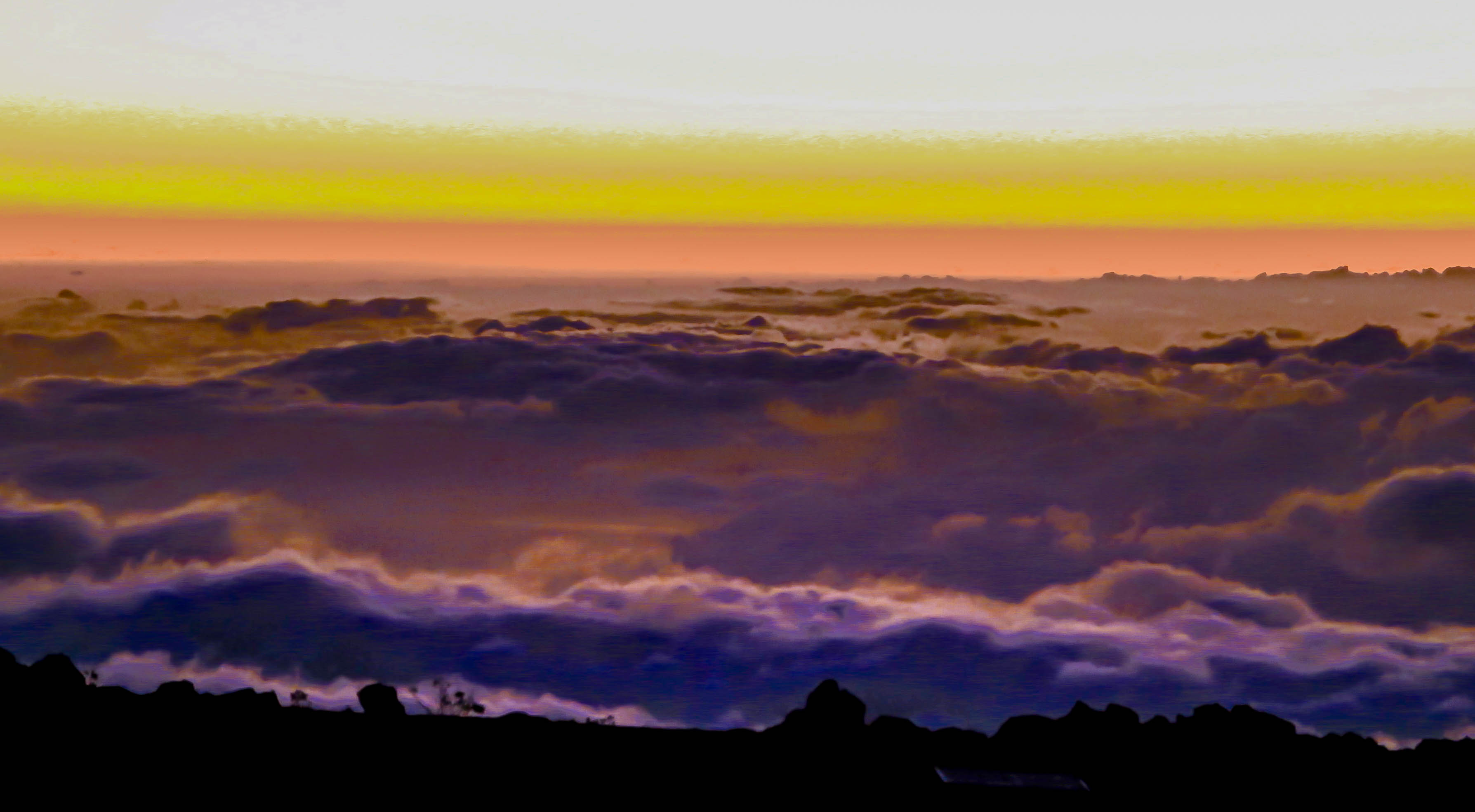Sunset at Haleakala Summit on Maui - Contact page for The Traveling Empty Nester